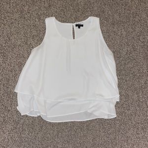 White flowy top